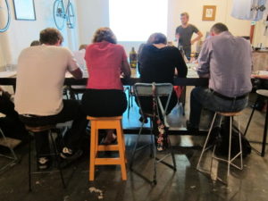 Students at a class learning to solve cryptic crosswords