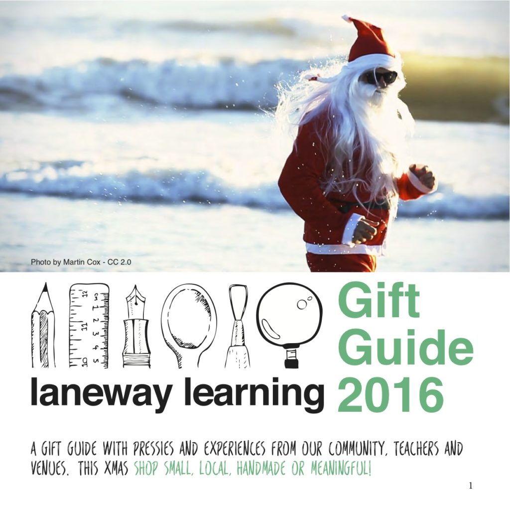 Guide guide front page with a person dressed as Santa running on a beach